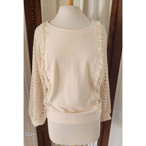 T56 Trendy 'See And Be Seen' cream knit  top/w lacy see-thru sides & sleeves